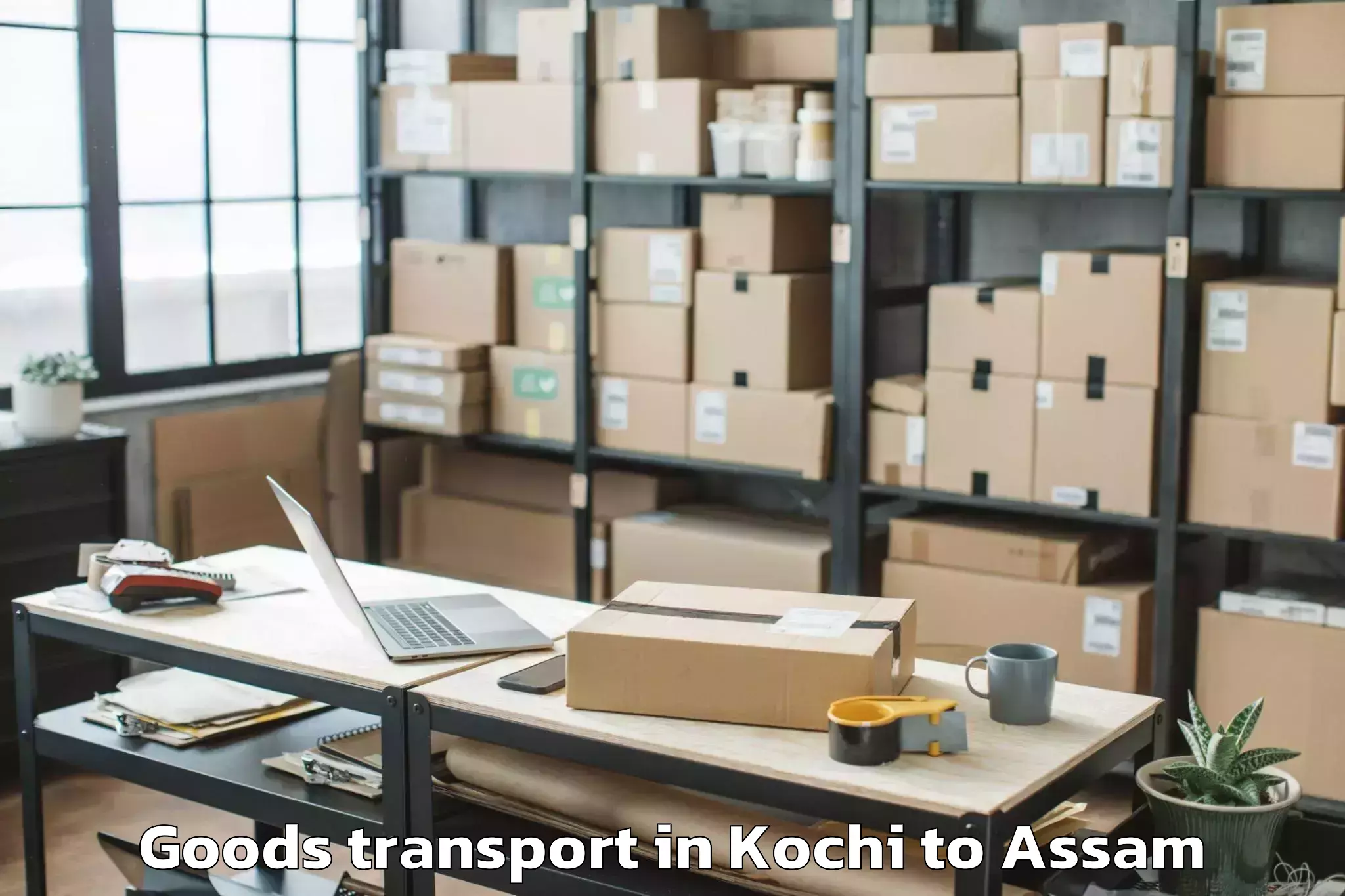 Top Kochi to Sualkuchi Goods Transport Available